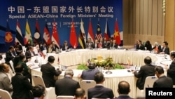 China's Foreign Minister Wang Yi (C) speaks during the Special ASEAN-China Foreign Ministers' Meeting in Yuxi, Yunnan Province, China, June 14, 2016