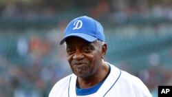 Former Negro League baseball player Eugene Scruggs watches the teams warm up before a baseball game between the Detroit Tigers and Cleveland in Detroit, June 8, 2018. 