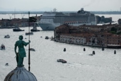 FILE - MSC Magnifica cruise ship passes in the Giudecca Canal in Venice, Italy, June 9, 2019.