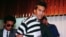FILE - Drug trafficker Demetrio Chavez is shown to reporters in a striped uniform that previously had been reserved for guerrilla suspects, Jan. 27, 1994 