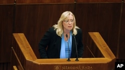 Slovakia's Prime Minister Iveta Radicova holds a speech during a Parliament session during which the lawmakers will vote on the approval for more money for the EU bailout fund in Bratislava, Slovakia, October 11, 2011.