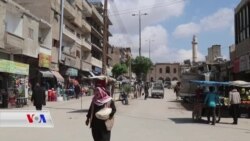 بازاری پیاوان لە ڕەققە