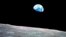 FILE - This Dec. 24, 1968, photo made available by NASA shows the Earth behind the surface of the moon during the Apollo 8 mission.