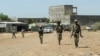 Members of the Amhara Special Force return to the Dansha Mechanized 5th division military base after fighting against the Tigray People's Liberation Front, in Danasha, Amhara region near a border with Tigray, Ethiopia, Nov. 9, 2020.