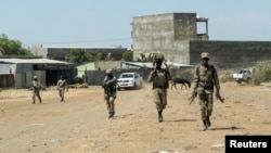 Members of the Amhara Special Force return to the Dansha Mechanized 5th division military base after fighting against the Tigray People's Liberation Front, in Danasha, Amhara region near a border with Tigray, Ethiopia, Nov. 9, 2020.