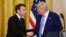 President Donald Trump, right, and France's President Emmanuel Macron shake hands during a joint press conference in the East Room of the White House in Washington, Monday, Feb. 24, 2025.