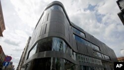 FILE - One of the latest additions to Poland’s growing luxury goods market, the Wolf Bracka department store, in Warsaw, May 31, 2012. 