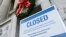 A sign is seen at the National Archives building that is closed because of a partial U.S. government shutdown in Washington, Dec. 22, 2018.