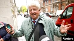 FILE - Stanley Johnson, father of Britain's Prime Minister Boris Johnson, is seen in Westminster, in London, Britain, Sept. 24, 2019. 