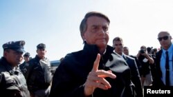 El presidente brasileño, Jair Bolsonaro, a su llegada a un hotel donde tiene previsto ofrecer una rueda de prensa sobre la mata amazónica y reunirse con el empresario Elon Musk, en Porto Feliz, en el estado de Sao Paulo, el 20 de mayo de 2022.