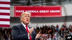 President Donald Trump arrives at a rally at Resch Center Complex in Green Bay, Wis., Saturday, April 27, 2019. 