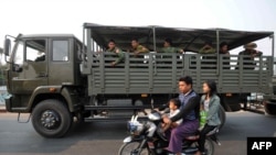 မြို့တွင်းလုံခြုံရေး ကင်းလှည့်နေတဲ့ စစ်ကားတစီး (ဓာတ်ပုံ - AFP)