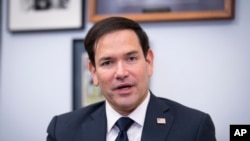 FILE - Sen. Marco Rubio, R-Fla., President-elect Trump's nominee to be secretary of State, speaks as he meets with Sen. Lindsey Graham, R-S.C., at the Capitol in Washington, Dec. 3, 2024.