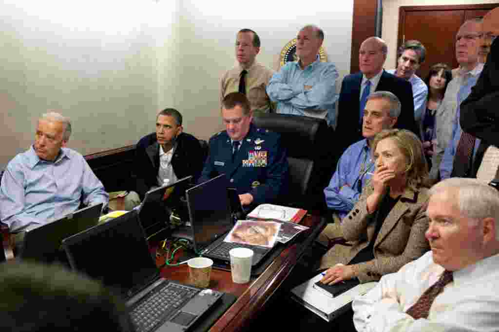 May 1: President Barack Obama and Vice President Joe Biden, along with members of the national security team, receive an update on the mission against Osama bin Laden in the Situation Room of the White House. (White House photo by Pete Souza)