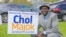 FILE - Chol Majok is seen with a primary election campaign sign in a photo from his Facebook campaign page.