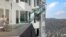 An artist rendering of the "Skyslide" attraction, an outdoor glass slide positioned close to 1,000 feet above downtown Los Angeles, California, is shown in this image released by OUE Skyspace, March 2, 2016. 