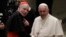 Pope Francis, right, shakes hands with Cardinal Carlos Aguiar Retes, at the Vatican, Nov. 23, 2016. On Thursday, Francis appointed Aguiar archbishop of Mexico City.