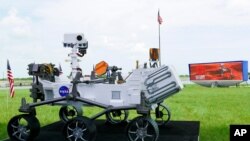 A replica of the Mars rover Perseverance is displayed outside the press site before a news conference at the Kennedy Space Center July 29, 2020, in Cape Canaveral, Fla. 