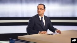 France President Francois Hollande during a televised interview on a French TV channel, March 28, 2013, in Paris.