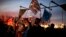 Activist protest outside of the COP25 climate talks congress in Madrid, Spain, Saturday, Dec. 14, 2019.
