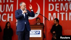 Turkish Sportminister Akif Cagatay Kilic speaks during a pro-government protest for President Tayyip Erdogan, in Cologne, Germany, July 31, 2016.