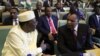 Chad President Idriss Deby talks to Republic of Congo President Denis Sassou Nguesso during the High Level Consultation Meetings of Heads of State and Government on the situation in the Democratic Republic of Congo at the African Union Headquarters, Addis Ababa, Jan. 17, 2019.