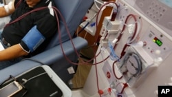  In this Monday, Sept. 24, 2018 file photo, a patient undergoes dialysis at a clinic in Sacramento, Calif.