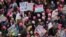Protesters gather near the U.S. Capitol in Washington D.C. for the Women' March, Jan. 21, 2017. (Photo: B. Allen / VOA) 