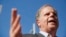Alabama Democrat Senate candidate Doug Jones speaks to the media, Nov. 14, 2017, in Birmingham, Alabama. President Donald Trump attacked Jones as a lawmaker who would be a "puppet" to party leaders if he is elected next month.