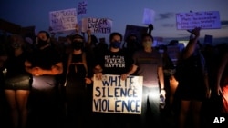 Protesters block traffic on the highway during protests Saturday, June 13, 2020, near the Atlanta Wendy's where Rayshard Brooks was shot and killed by police Friday evening following a struggle in the restaurant's drive-thru line in Atlanta. (AP…