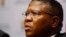 South African Minister of Sport Fikile Mbalula speaks to the media during a press briefing at parliament in Cape Town, March. 17, 2016. 
