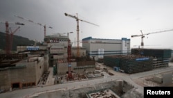 FILE - A nuclear reactor and related factilities as part of the Taishan Nuclear Power Plant, to be operated by China Guangdong Nuclear Power (CGN), is seen under construction in Taishan, Guangdong province, October 17, 2013. 