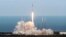 A SpaceX Falcon 9 rocket lifts off from launch complex 40 at the Cape Canaveral Air Force Station in Cape Canaveral, Florida, April 2, 2018. 
