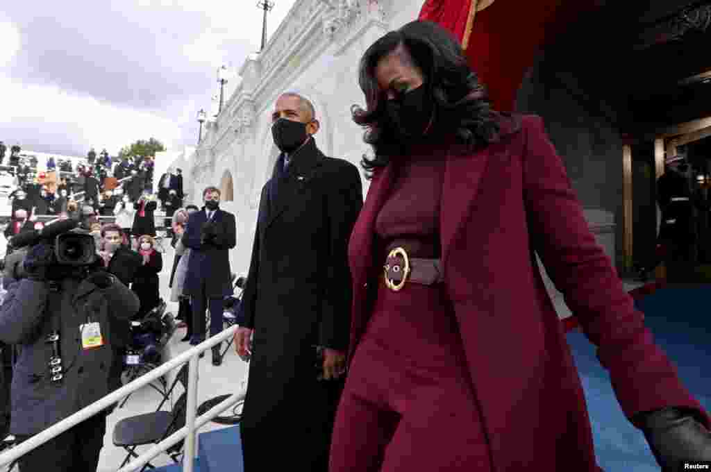 Former U.S. President Barack Obama and wife Michelle Obama arrive before the inauguration of Joe Biden as the 46th President of the United States on the West Front of the U.S. Capitol in Washington.