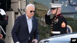 FILE - President Joe Biden arrives at Delaware Air National Guard Base in New Castle, Del., Oct. 26, 2024. 