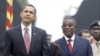 President Barrack Obama (l) and President John Atta-Mills (r)
