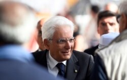 Italian President Sergio Mattarella arrives for the ceremony marking the first anniversary of the collapse of a motorway Morandi Bridge that killed 43 people in Genoa, Aug. 14, 2019.