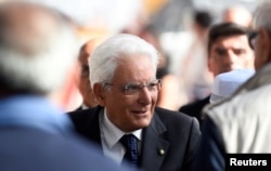 Italian President Sergio Mattarella arrives for the ceremony marking the first anniversary of the collapse of a motorway Morandi Bridge that killed 43 people in Genoa, Aug. 14, 2019.