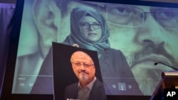 FILE - In this Nov. 2, 2018, photo, a video image of Hatice Cengiz, fiancee of slain Saudi journalist Jamal Khashoggi, picured below, is displayed during a memorial event in Washington, Oct. 2, 2018.