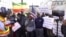 Ethiopian-Americans rally against the Trump administration's involvement in negotiations over the Great Ethiopian Renaissance Dam project, in Washington, Feb. 27, 2020. (Habtamu Seyoum/VOA)