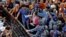 A translator from the Thai embassy talks to protesters in support of the two Myanmar migrant workers Zaw Lin and Win Zaw Htun, in front of the Thai embassy in Yangon, Dec. 25, 2015.