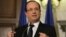 French President Francois Hollande gestures speaks during a news conference, February 19, 2013.