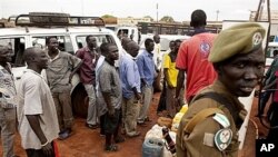 Fighting in Abyei has led to extreme fuel shortages in Wau, where Southern Sudanese wait in line to purchase petrol, May 25, 2011.