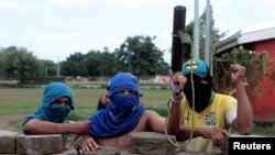 Manifestantes en Masaya, Nicaragua detrás de una barricada durante una protesta contra el presidente Daniel Ortega. May 15, 2018. REUTERS/Oswaldo Rivas - RC1492B1F8F0