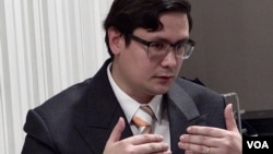 In this photo taken from video, Rangsiman Rome, chair of the Thai House Committee on National Security, talks about solutions to migration problems in his nation, in Bangkok on Sept. 25, 2024.