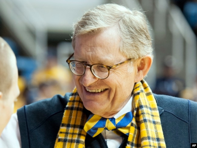 FILE - WVU President Gordon Gee during a basketball game in 2014. (AP Photo/Andrew Ferguson)