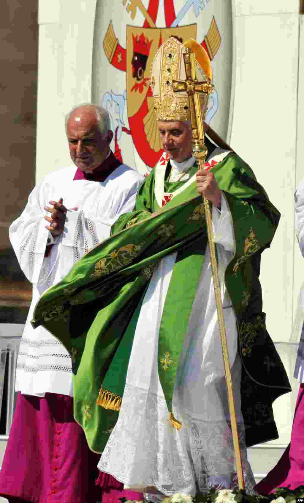 Pope Benedict XVI arrives to celebrate an open-air mass at Palermo, in the island of Sicily, Sunday, Oct. 3, 2010. Pope Benedict XVI paid tribute Sunday to a Palermo priest slain by the Mafia and encouraged Sicilians not to resign themselves to deep-roote