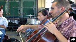 American and Vietnamese musicians rehearse