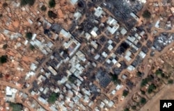 FILE - An aerial view of the Zamzam refugee camp after it was attacked, outside the Darfur town of El Fasher, Sudan, Feb. 13, 2025. (Maxar Technologies via AP)