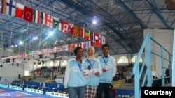 Munirah Warsame, left, is seen in an undated photo at a teakwondo competition. (Courtesy - Somalia Teakwondo Team)
